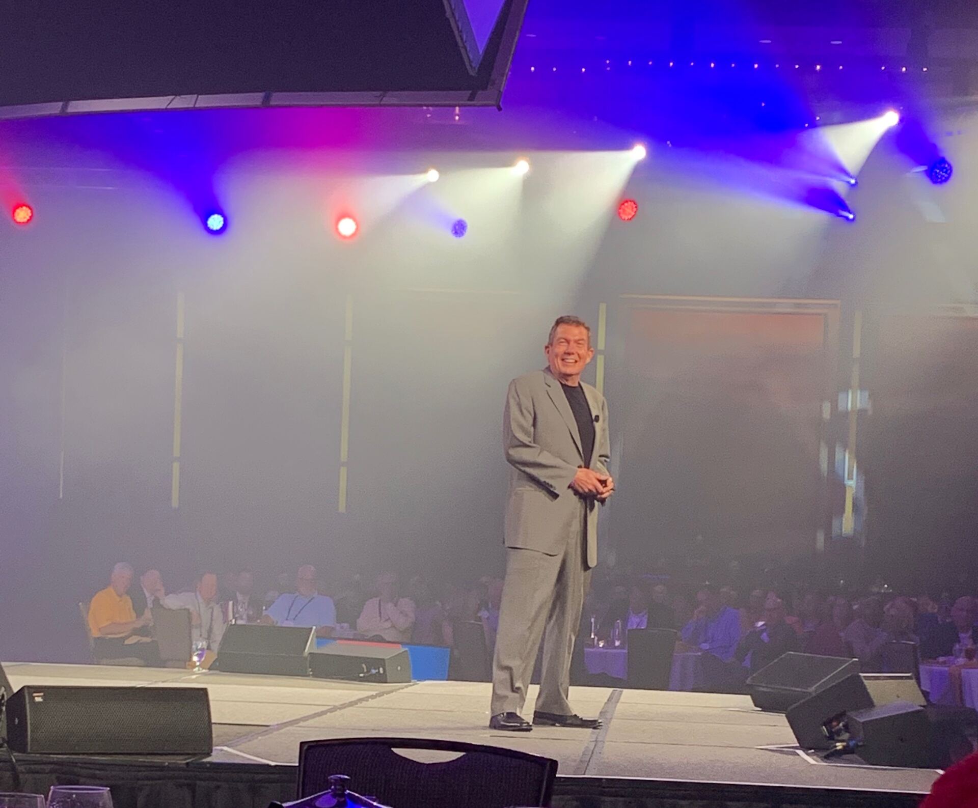 Terry L. Fossum delivering a keynote on a main stage
